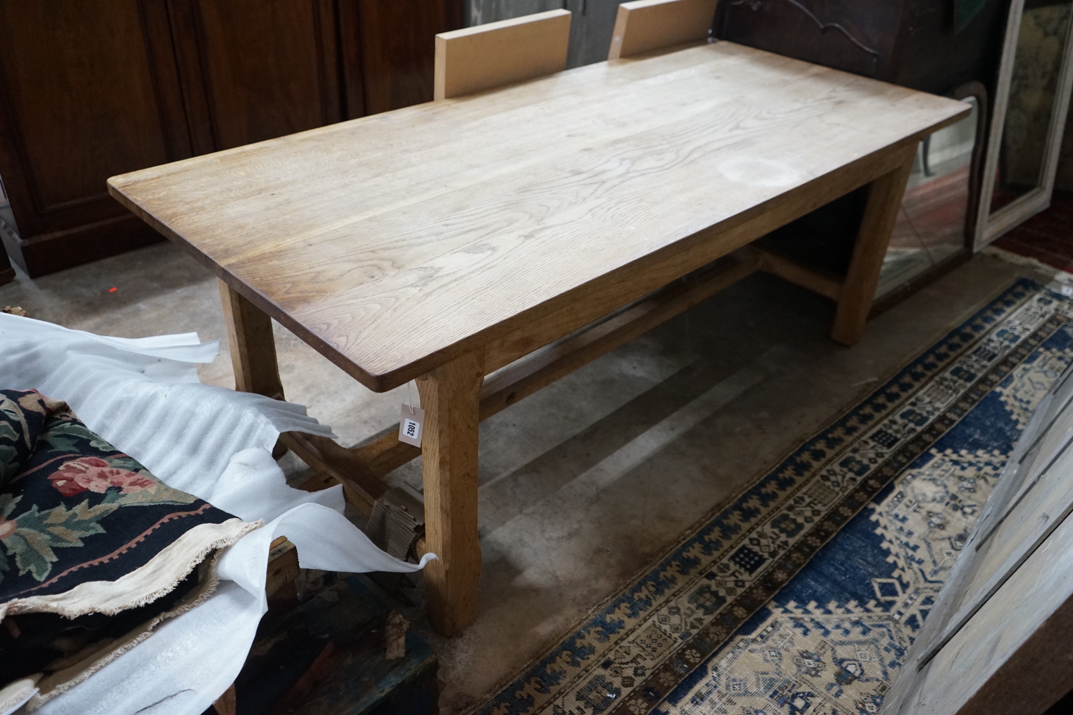 A rectangular oak refectory dining table with later end sections, length 202cm, depth 89cm, height 74cm